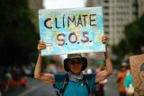 Climate protesters send message to UN: End fossil fuel use